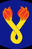196th Light Infantry Brigade shoulder insignia with crossed flaming torches