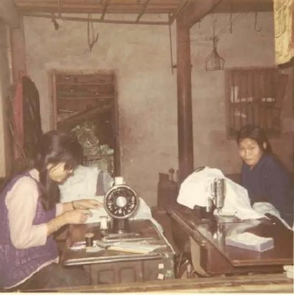 Seamstresses at work in village