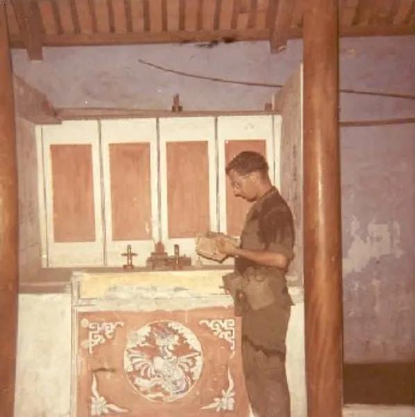 Soldier in temple with salty sweat on shirt and pants