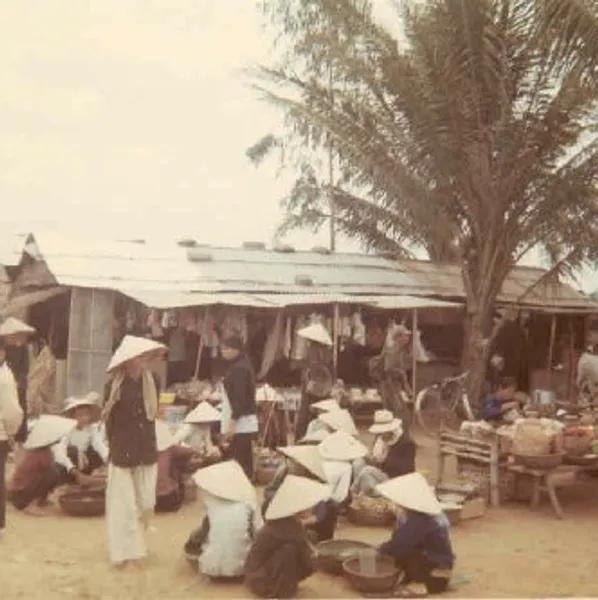 Sellers and shoppers in Vietnamese village